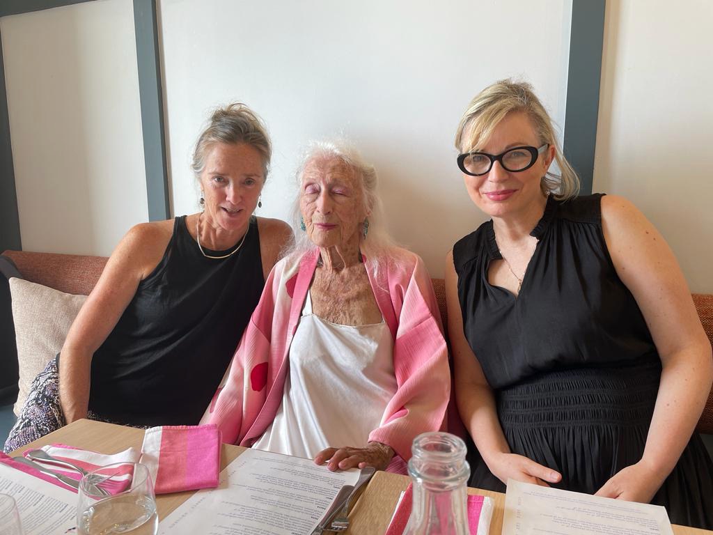 Eileen at lunch table with Sue Healey on the left and Kylie Melinda Smith on the right.