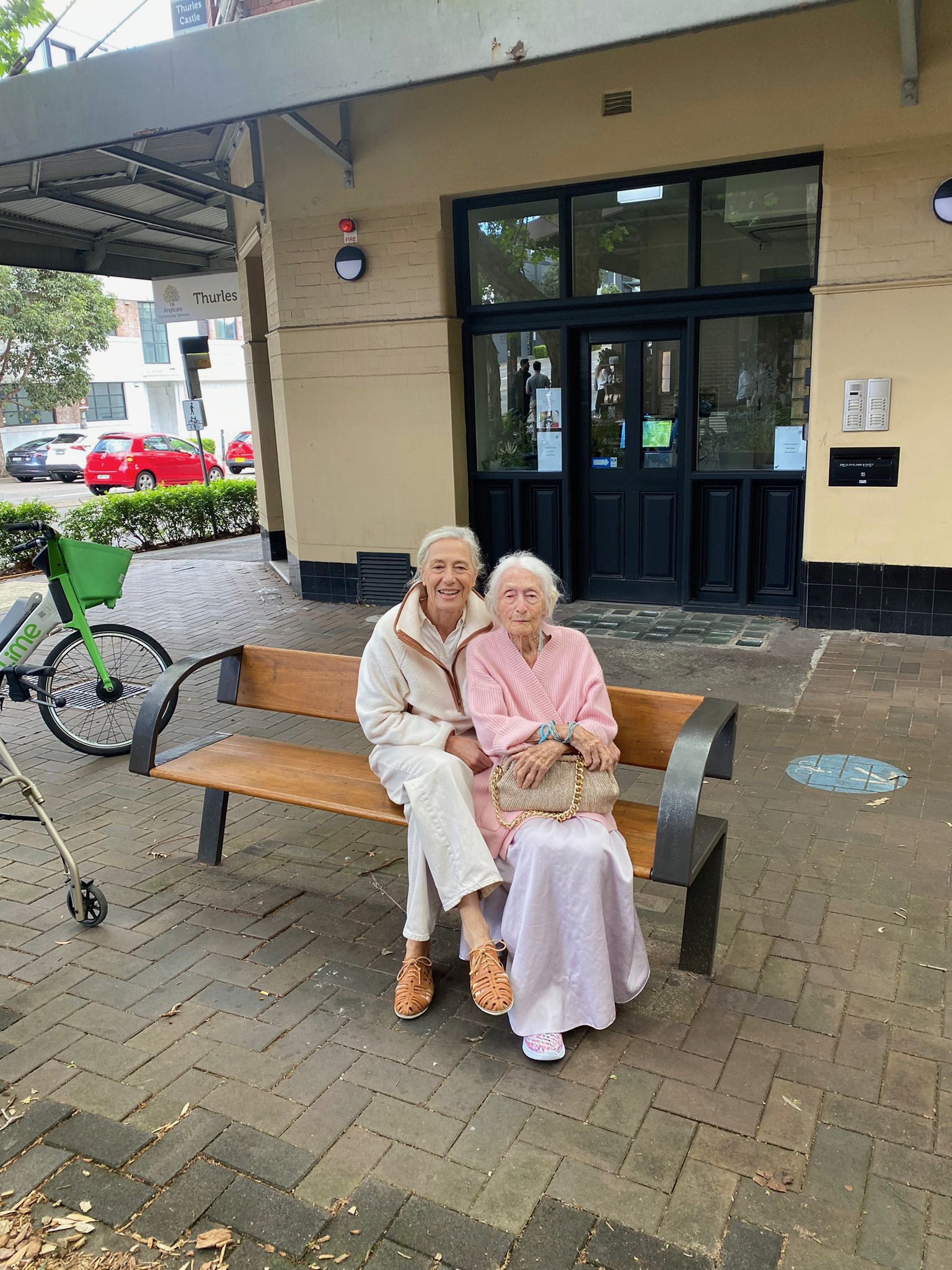 Eileen and Shane Carroll sitting on a bench outside Thurles Castle.